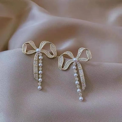 Ethonica Crystal Rhinestone Bow Earring with Pearl Accent