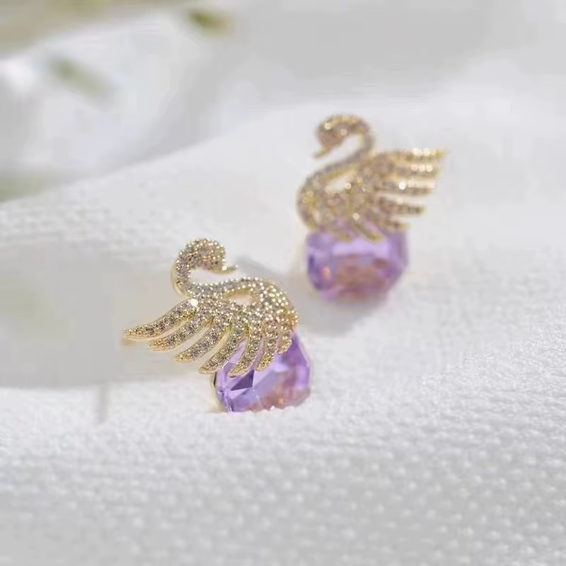 Ethonica Swan Stud Earrings with Purple Crystal Gemstone, Gold-Tone Pavé Rhinestone Wings.
