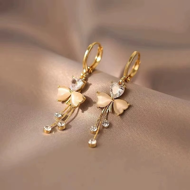 Ethonica Gold-Tone Butterfly Earrings with Opal Heart