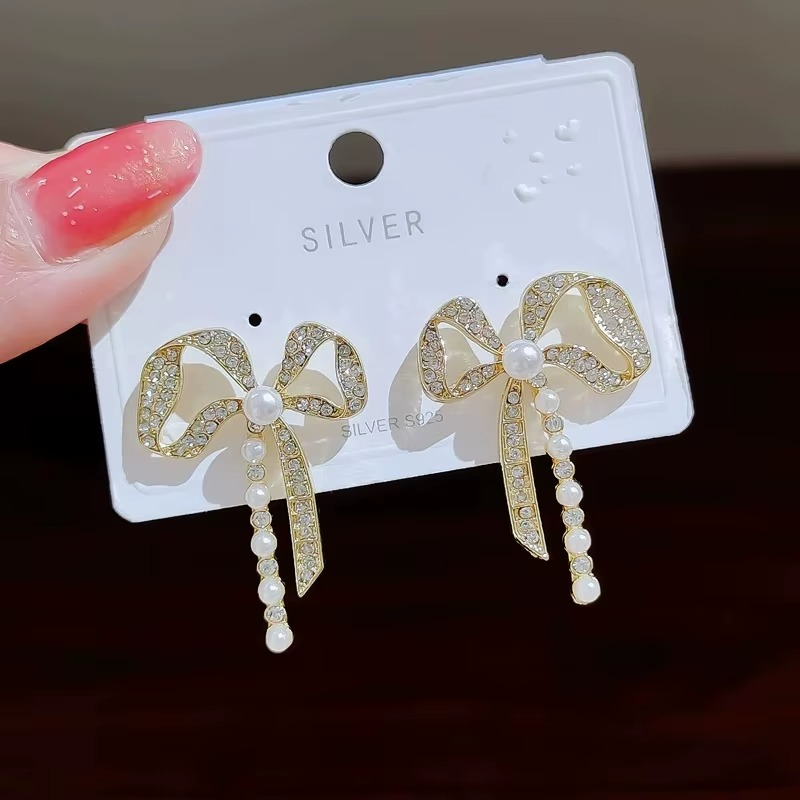 Ethonica Crystal Rhinestone Bow Earring with Pearl Accent