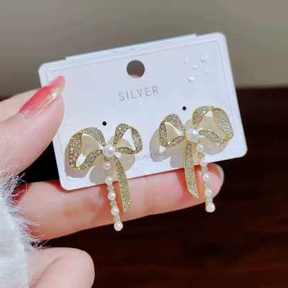 Ethonica Crystal Rhinestone Bow Earring with Pearl Accent