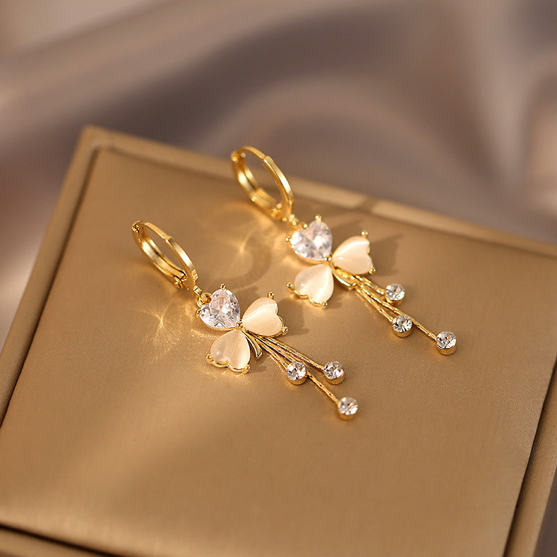 Ethonica Gold-Tone Butterfly Earrings with Opal Heart