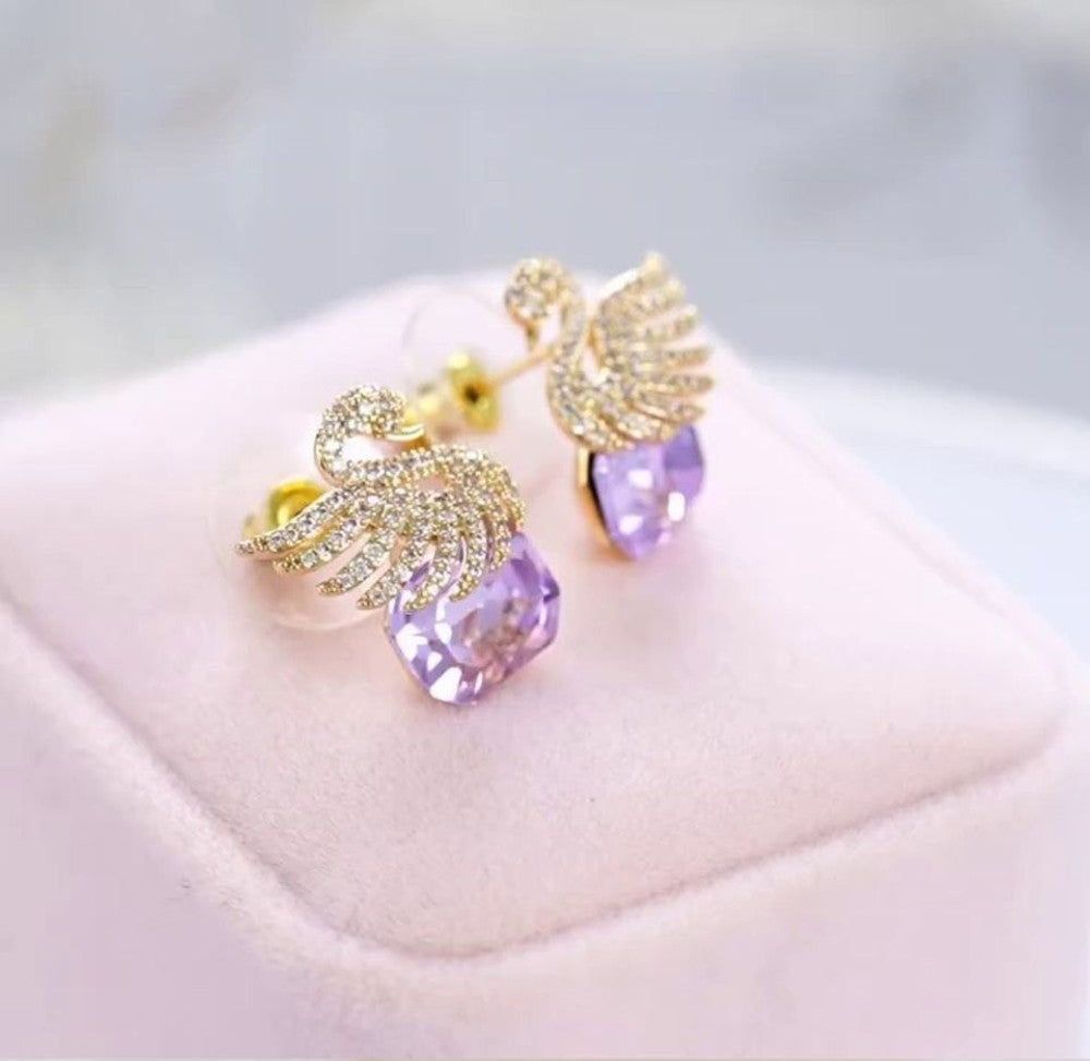 Ethonica Swan Stud Earrings with Purple Crystal Gemstone, Gold-Tone Pavé Rhinestone Wings.