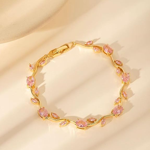 Elegant 18K gold plated bracelet with pink gemstones, showcasing anti tarnish jewelry design for everyday wear.